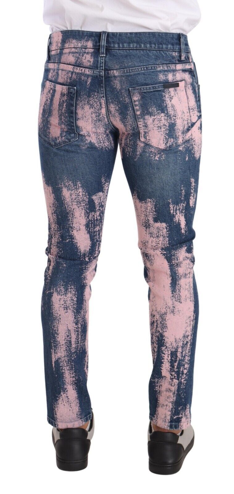 Jeans skinny en denim coton tie-dye bleu et rose de Dolce & Gabbana, vue de face, détails colorés et coupe ajustée