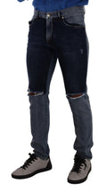 Jeans slim en denim tissé deux tons bleu Dolce & Gabbana, déchirés et tendance, en coton avec finition usée.
