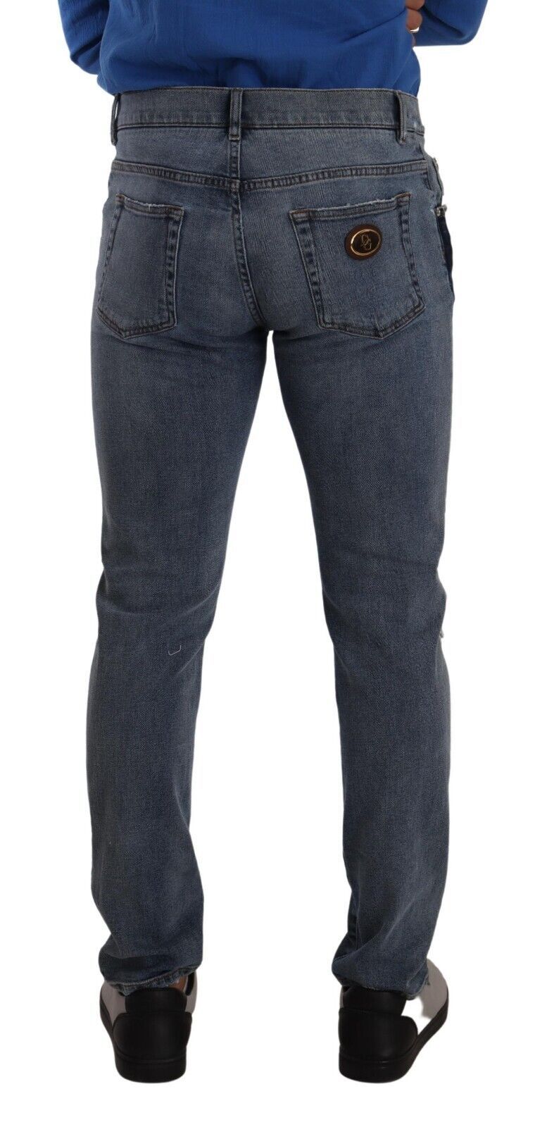 Jeans slim en denim tissé déchiré à deux tons bleu Dolce & Gabbana, coupe ajustée et style tendance.