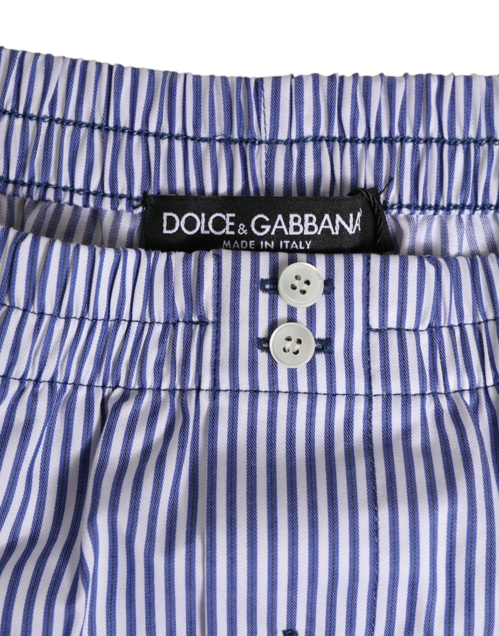Shorts de bain Dolce & Gabbana en coton bleu et blanc à rayures avec boutons, style décontracté et confortable.