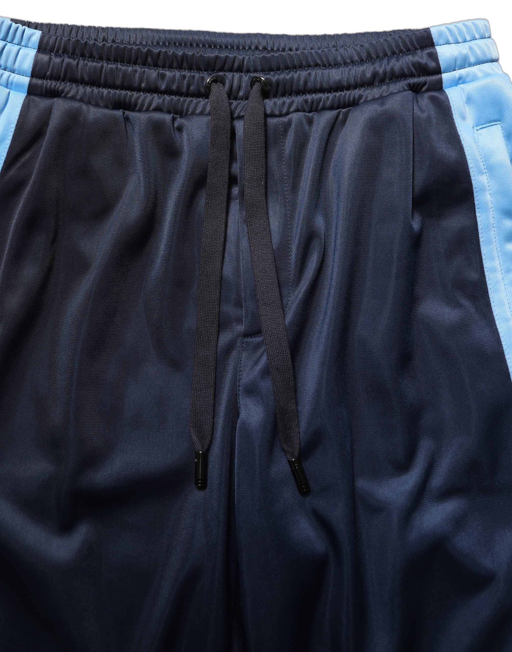 Pantalons de jogging Dolce & Gabbana bleu et blanc avec cordon de serrage, style décontracté et ajustable.