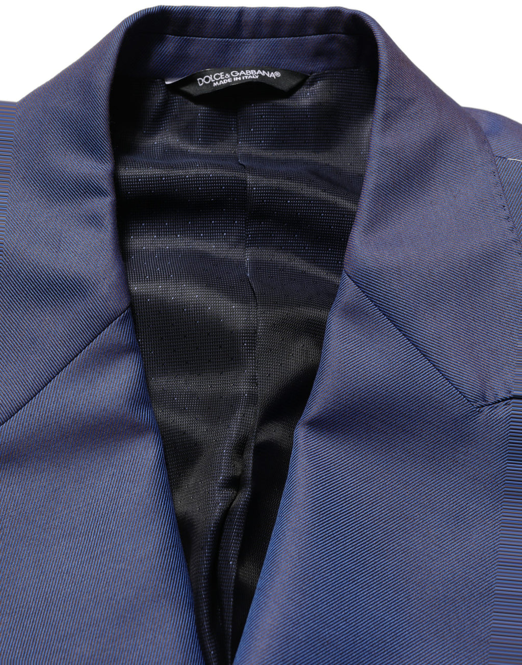 Blazer homme en laine bleue à double boutonnage Dolce & Gabbana, veste élégante avec col revers et poches frontales.