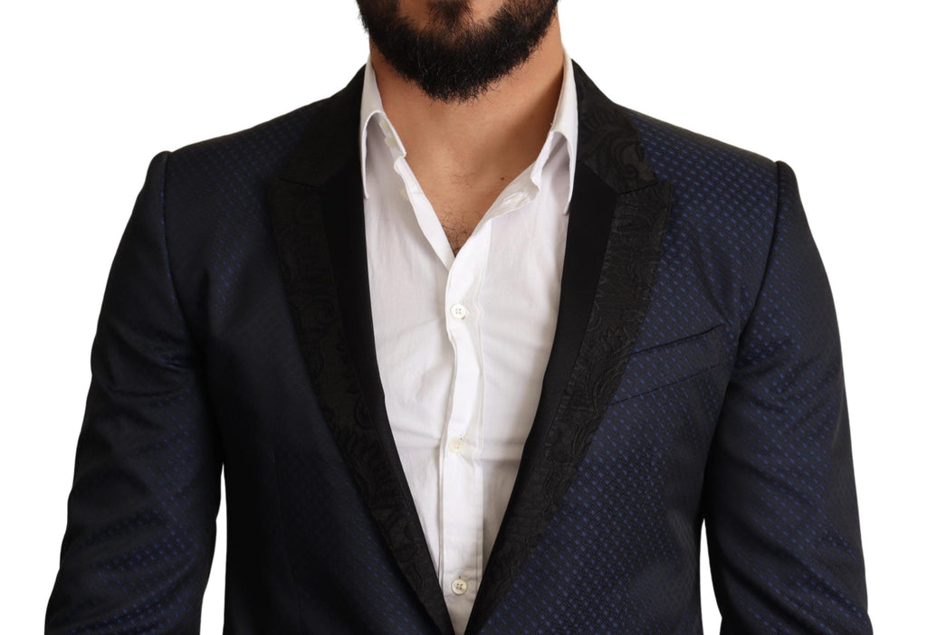Blazer slim fit en laine bleue Dolce & Gabbana Martini avec coupe élégante et détails modernes, porté sur mannequin.