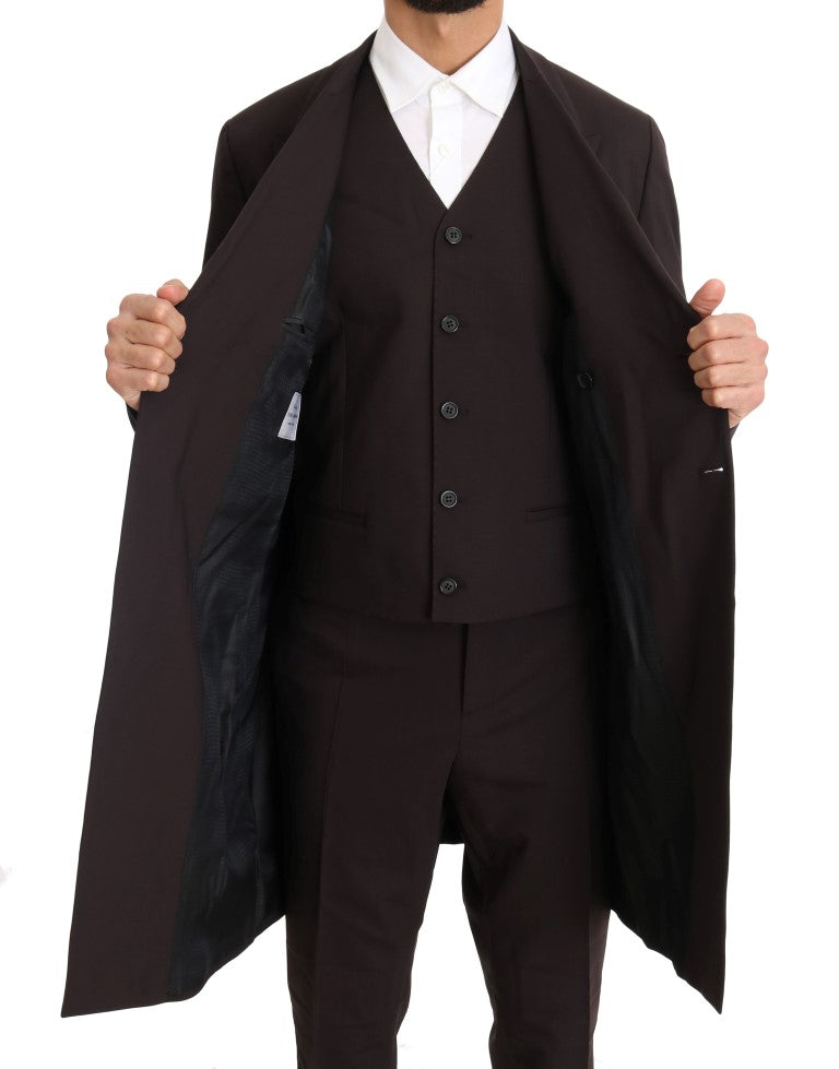 Costume longue en laine stretch bordeaux Dolce & Gabbana composé de trois pièces, élégant et sophistiqué.