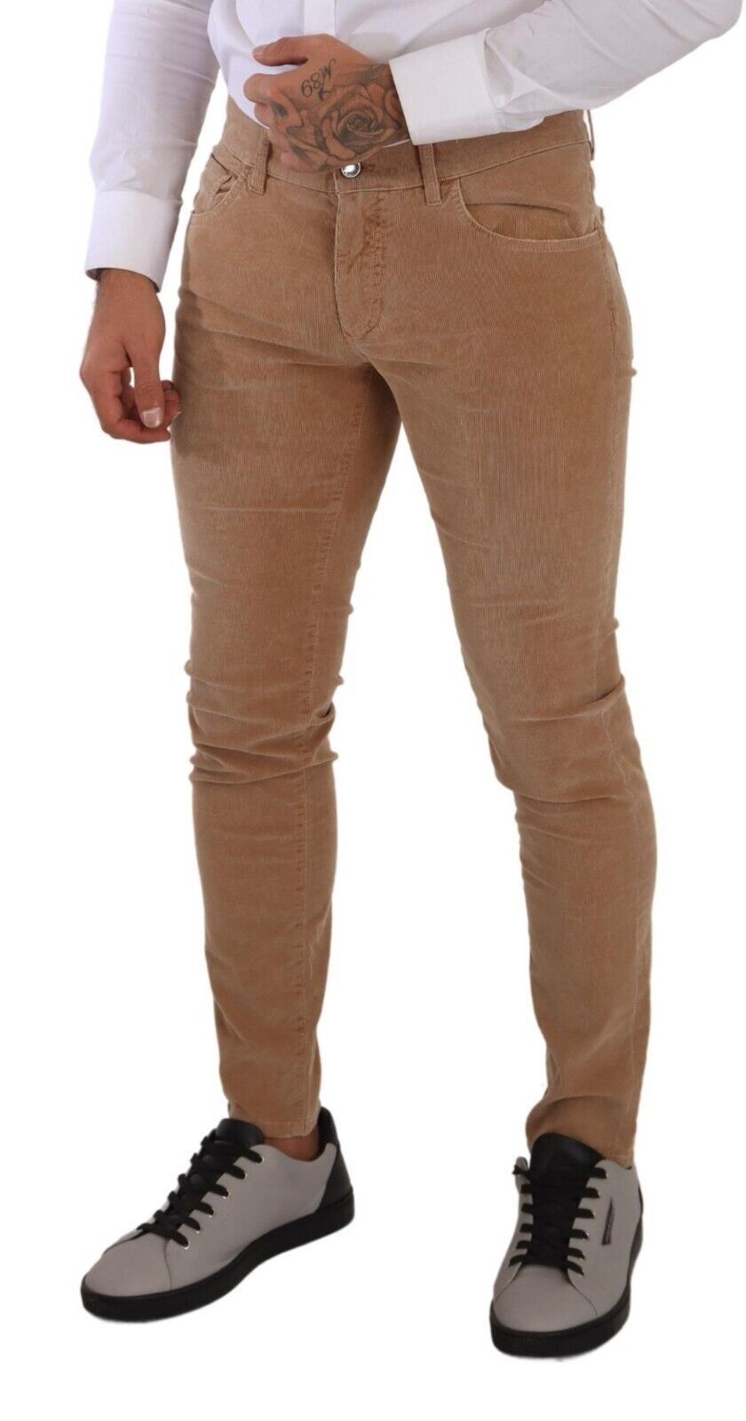 Jeans slim skinny en coton corduroy marron de Dolce & Gabbana, coupe ajustée et tendance, pour un style élégant et décontracté.