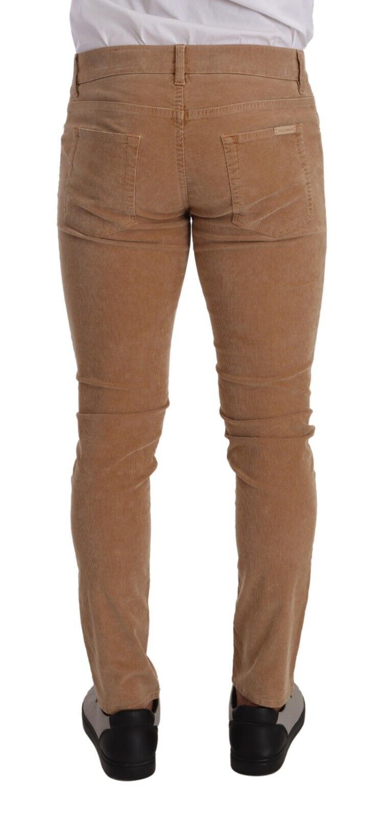 Jeans slim fit en velours côtelé marron de Dolce & Gabbana, en coton, mode élégante et confortable.