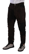 Jeans en denim marron Dolce & Gabbana, coupe régulière, en coton avec détails déchirés et usés.