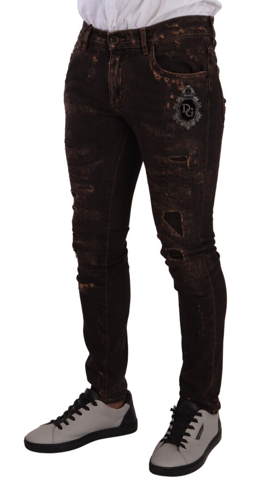 Jeans slim déchirés marron Dolce & Gabbana en denim skinny, détail usé et ajusté pour un style moderne.