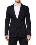 Veste blazer en coton bleu foncé Dolce & Gabbana Taormina, coupe élégante avec détails sophistiqués, portée sur un mannequin.