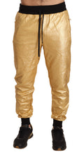 Pantalons en coton Dolce & Gabbana Gold Pig Of The Year, pantalon pour homme avec motif doré et détails élégants.