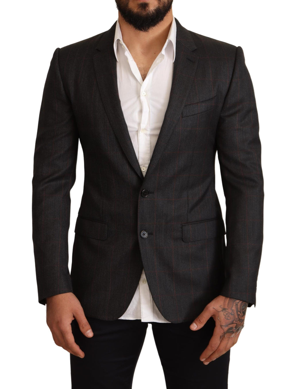 Veste blazer en laine à carreaux gris Dolce & Gabbana, coupe slim, élégante et moderne, portée sur un mannequin.