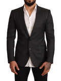 Veste blazer en laine à carreaux gris Dolce & Gabbana, coupe slim, élégante et moderne, portée sur un mannequin.