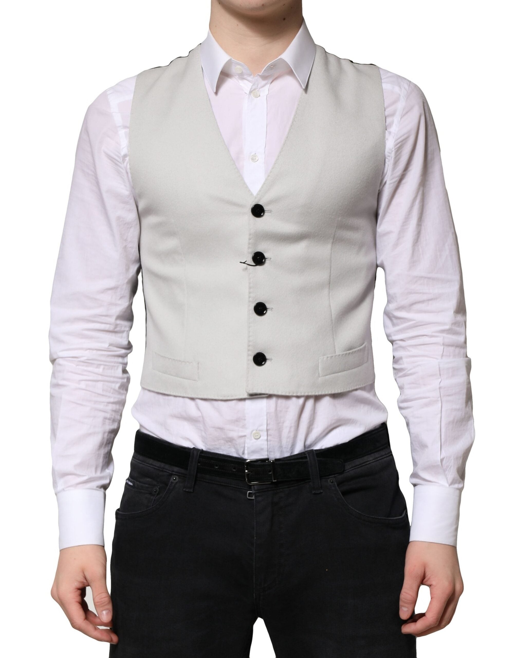 Gilet en laine gris Dolce & Gabbana pour homme, costume formel, détail élégant, porté sur une chemise blanche.