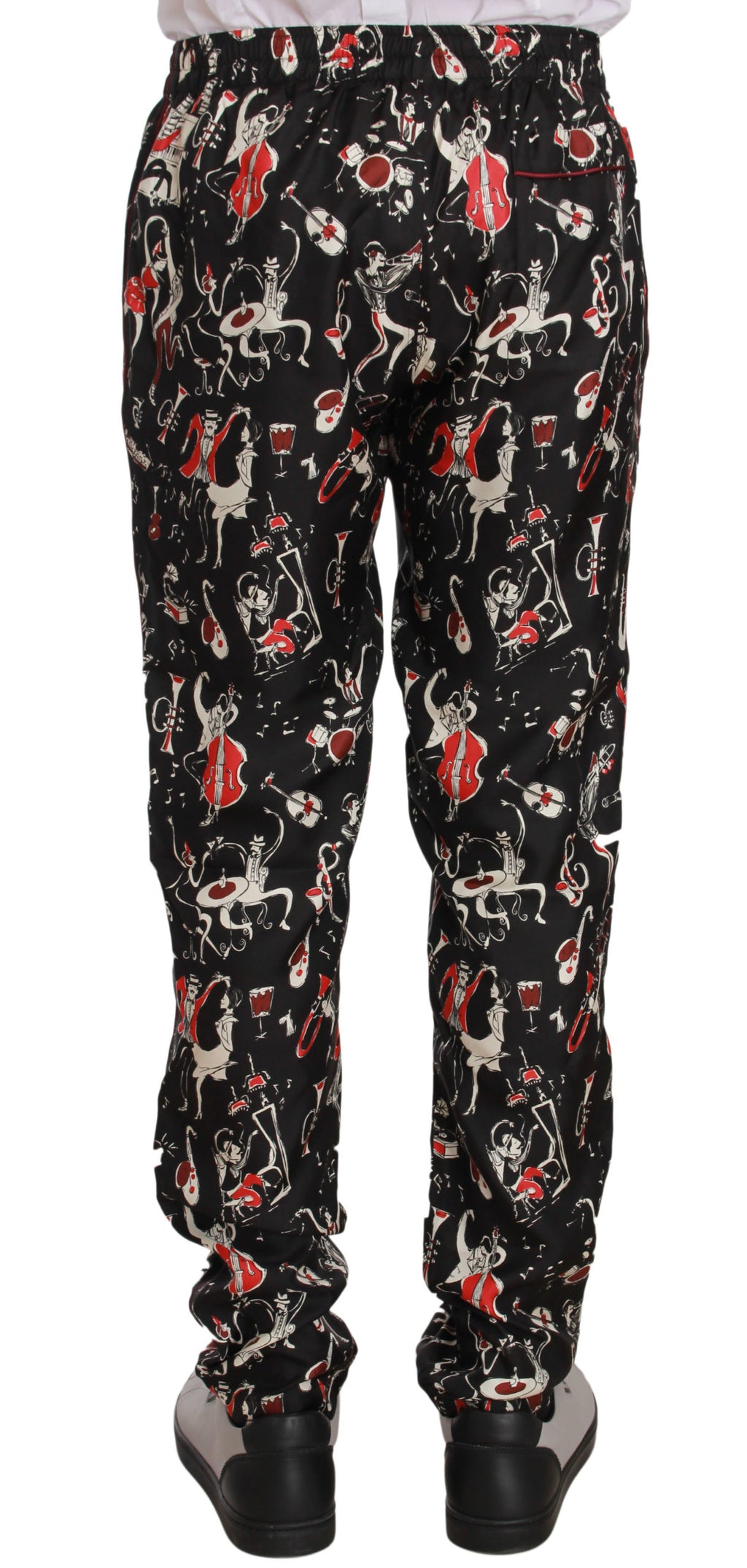 Pantalons de pyjama Dolce & Gabbana rouge à motif instruments de musique, style confortable et élégant pour dormir.