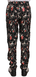 Pantalons de pyjama Dolce & Gabbana rouge à motif instruments de musique, style confortable et élégant pour dormir.