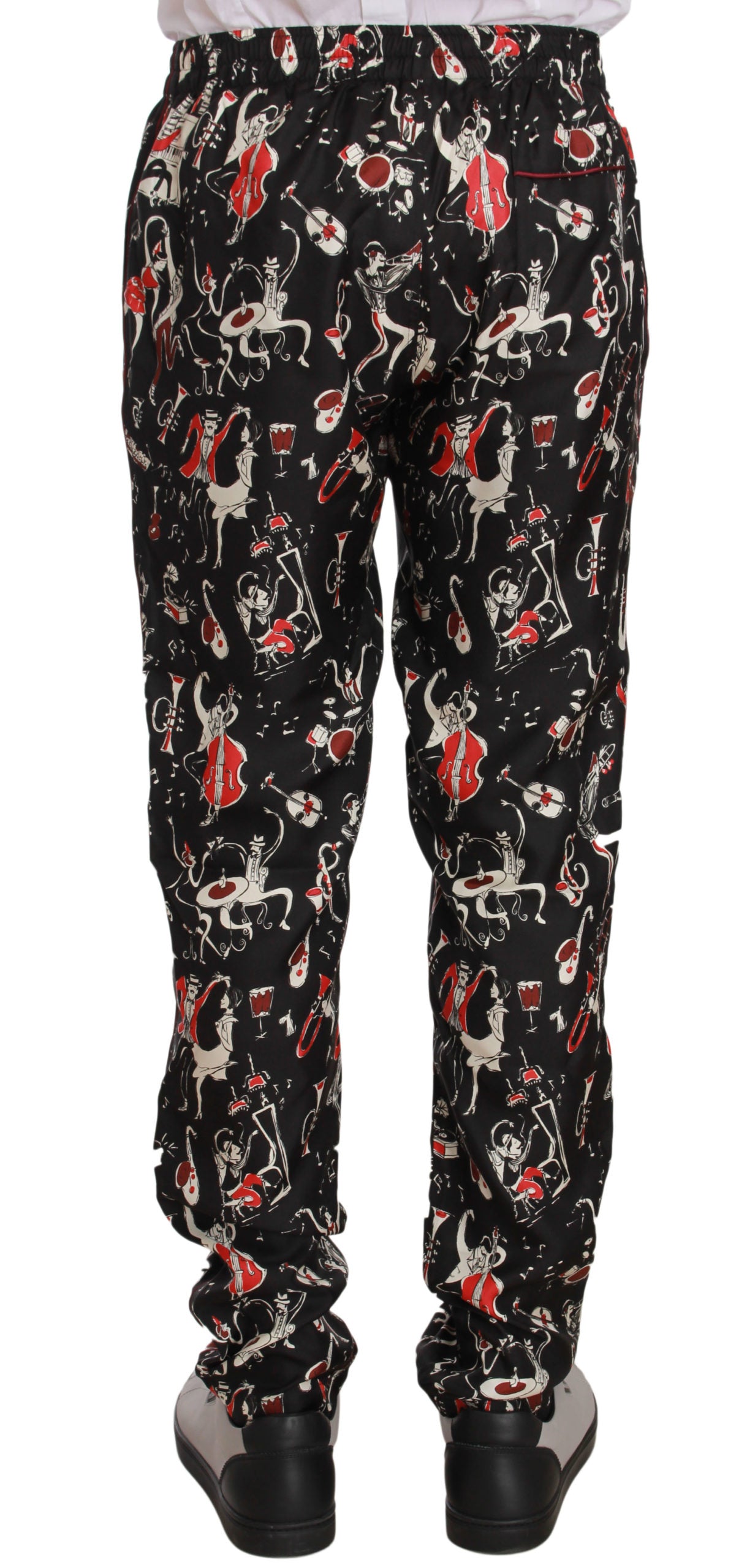 Pantalons de pyjama Dolce & Gabbana rouge à motif instruments de musique, style confortable et élégant pour dormir.