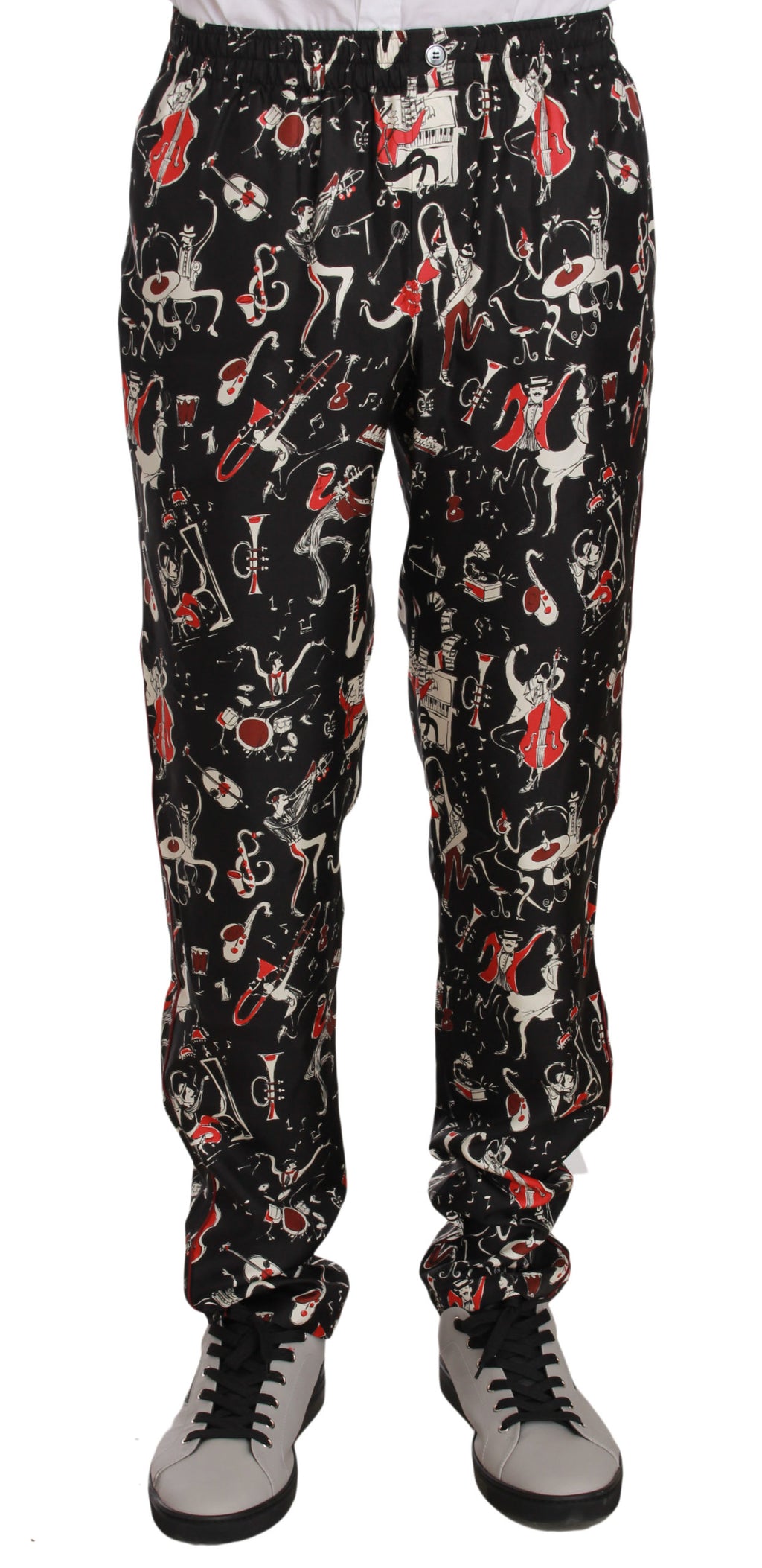Pantalon de sommeil Dolce & Gabbana en satin rouge avec imprimé d'instruments de musique, confort et style élégant.