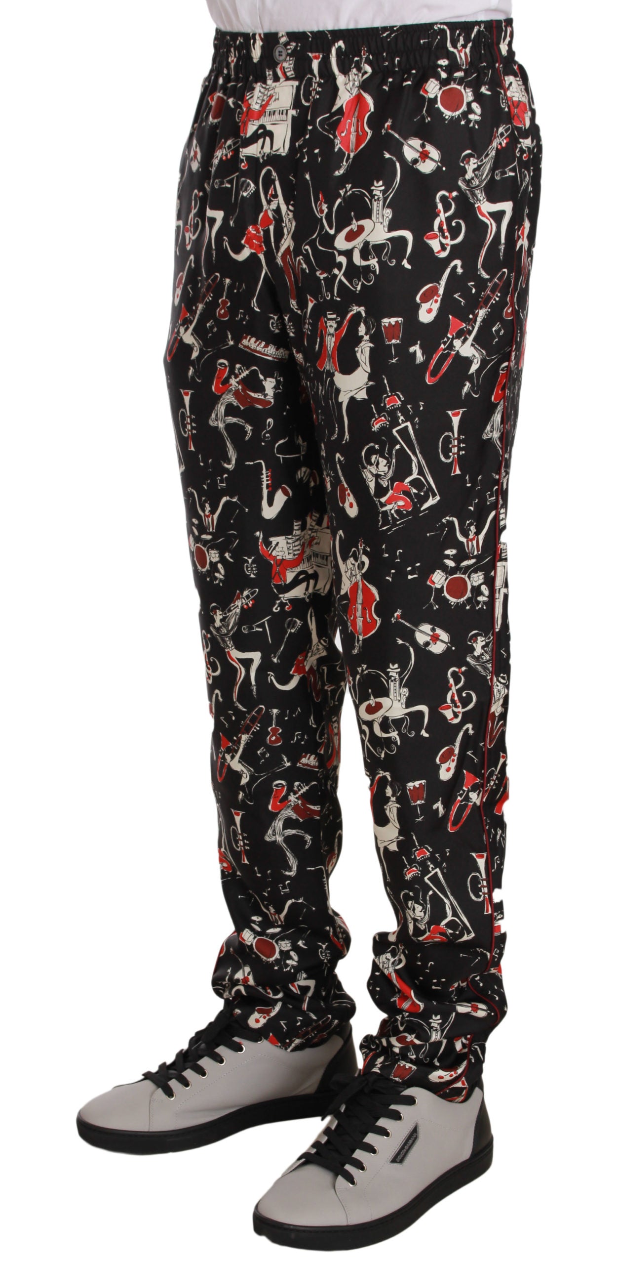 Pantalon de sommeil Dolce & Gabbana avec motif d'instruments de musique rouges, tissu doux et confortable.