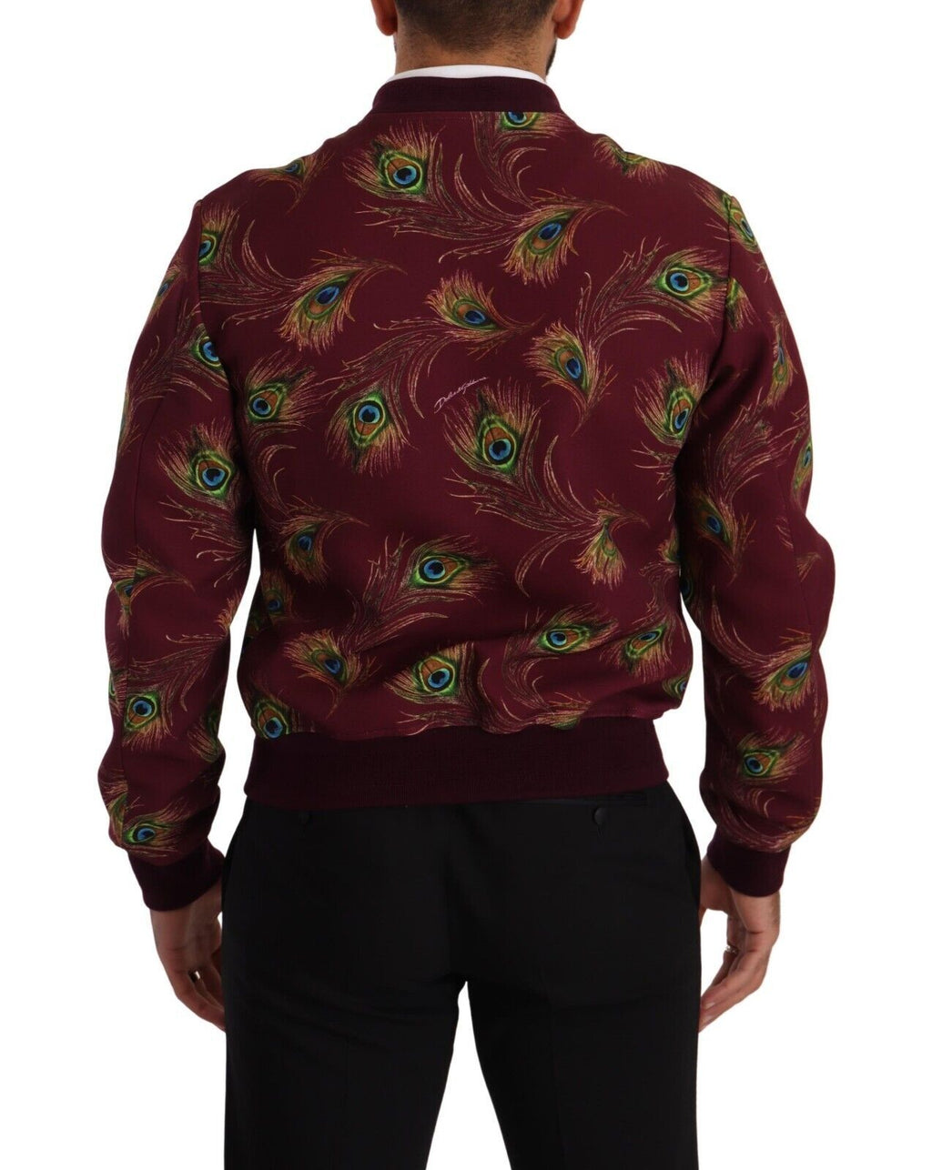 Veste en polyester stretch rouge avec zip complet Dolce & Gabbana, motif paon élégant, détails modernes et confort.