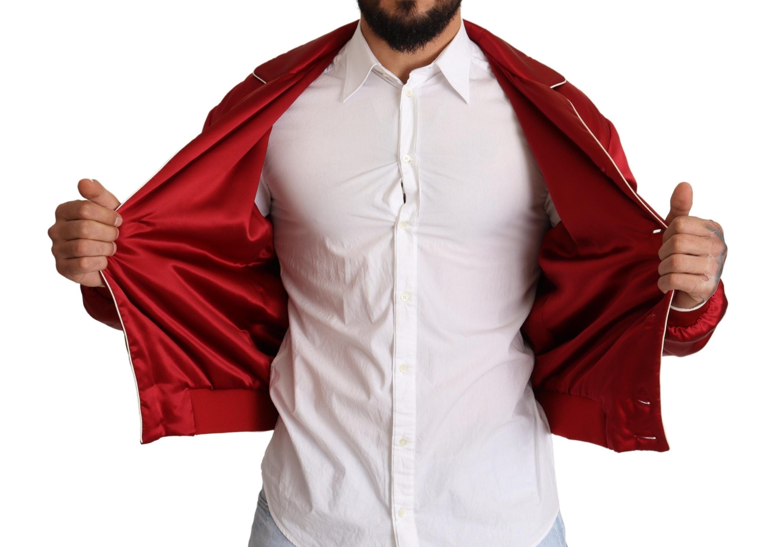 Veste bomber en soie rouge Dolce & Gabbana avec boutons et logo DG, élégante et moderne.