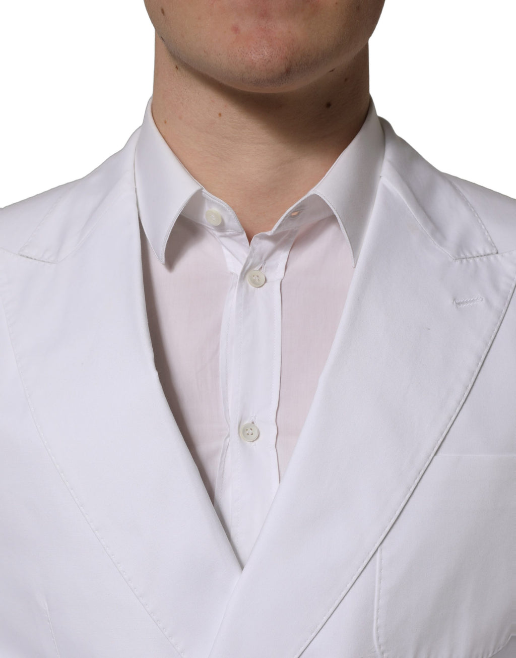 Veste blazer blanche en coton à double boutonnage de Dolce & Gabbana, élégante et sophistiquée, vue de face.