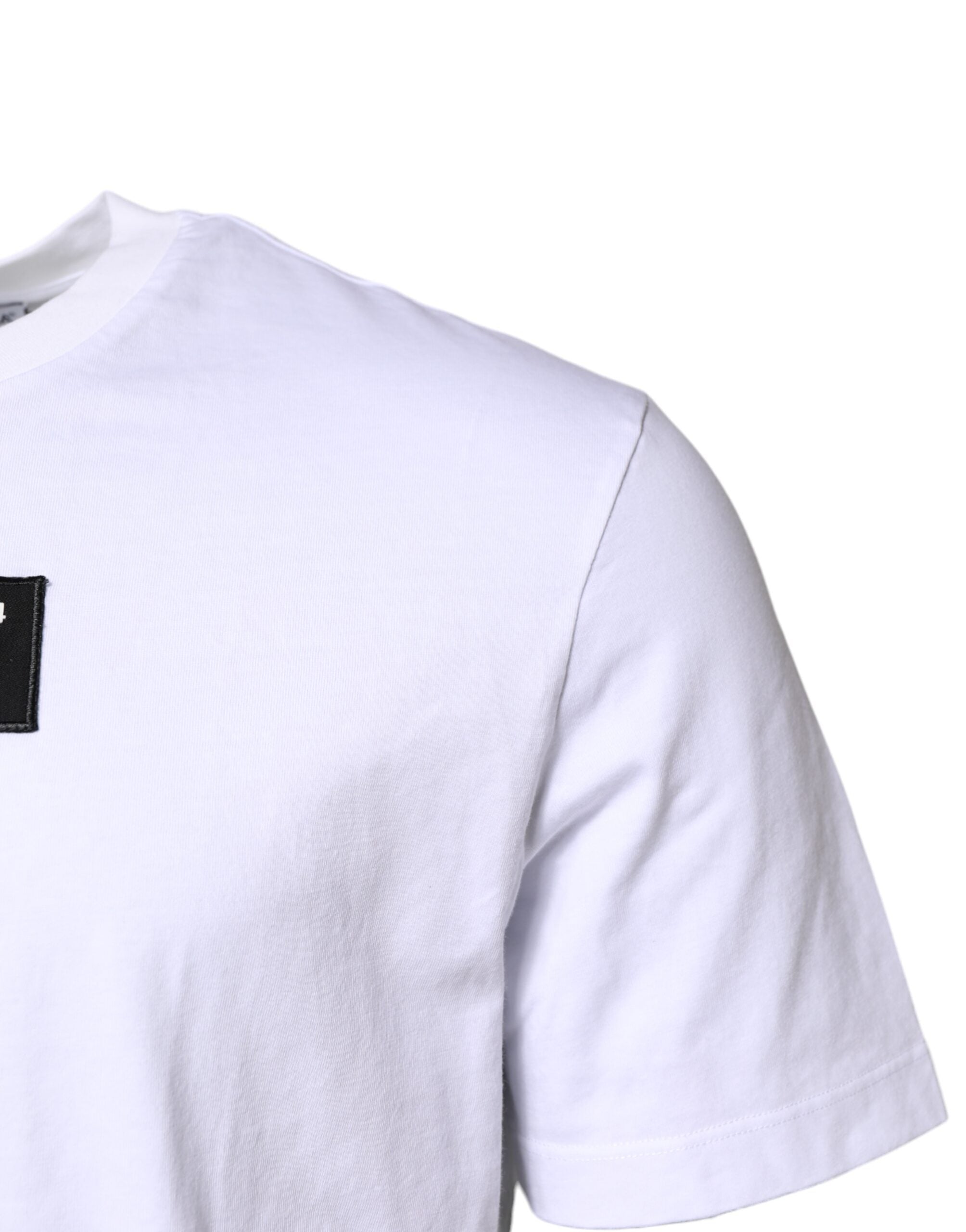 T-shirt blanc en coton Dolce & Gabbana avec logo brodé sur la poitrine, col rond, style décontracté et élégant.