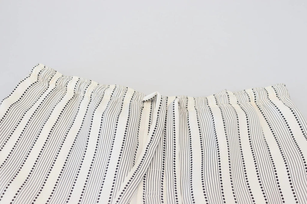 Pantalons de détente en soie blanche à rayures Dolce & Gabbana, style élégant et confortable pour femme.
