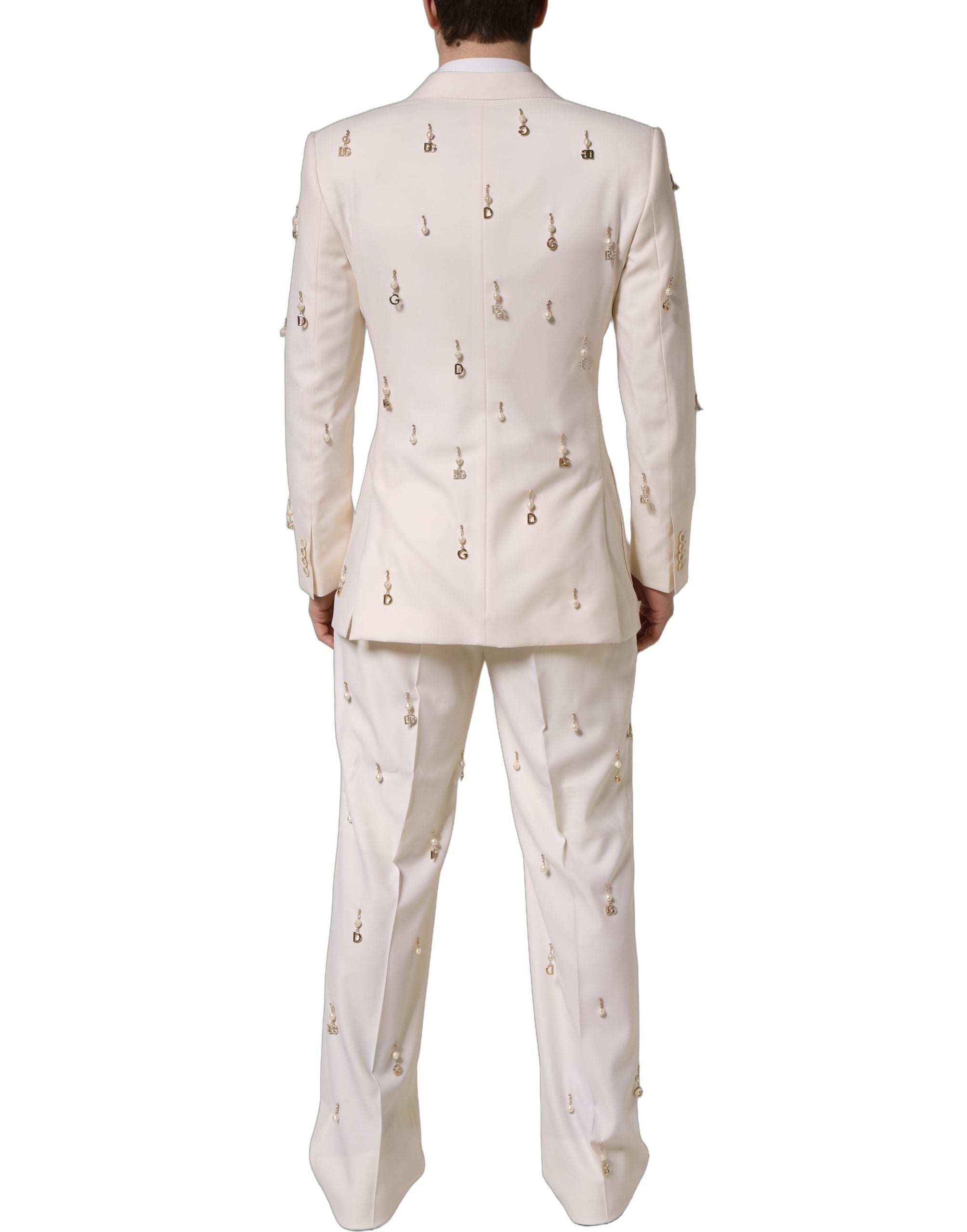 Costume homme Dolce & Gabbana en laine blanche, costume deux pièces ajusté pour occasion formelle, vue de face.