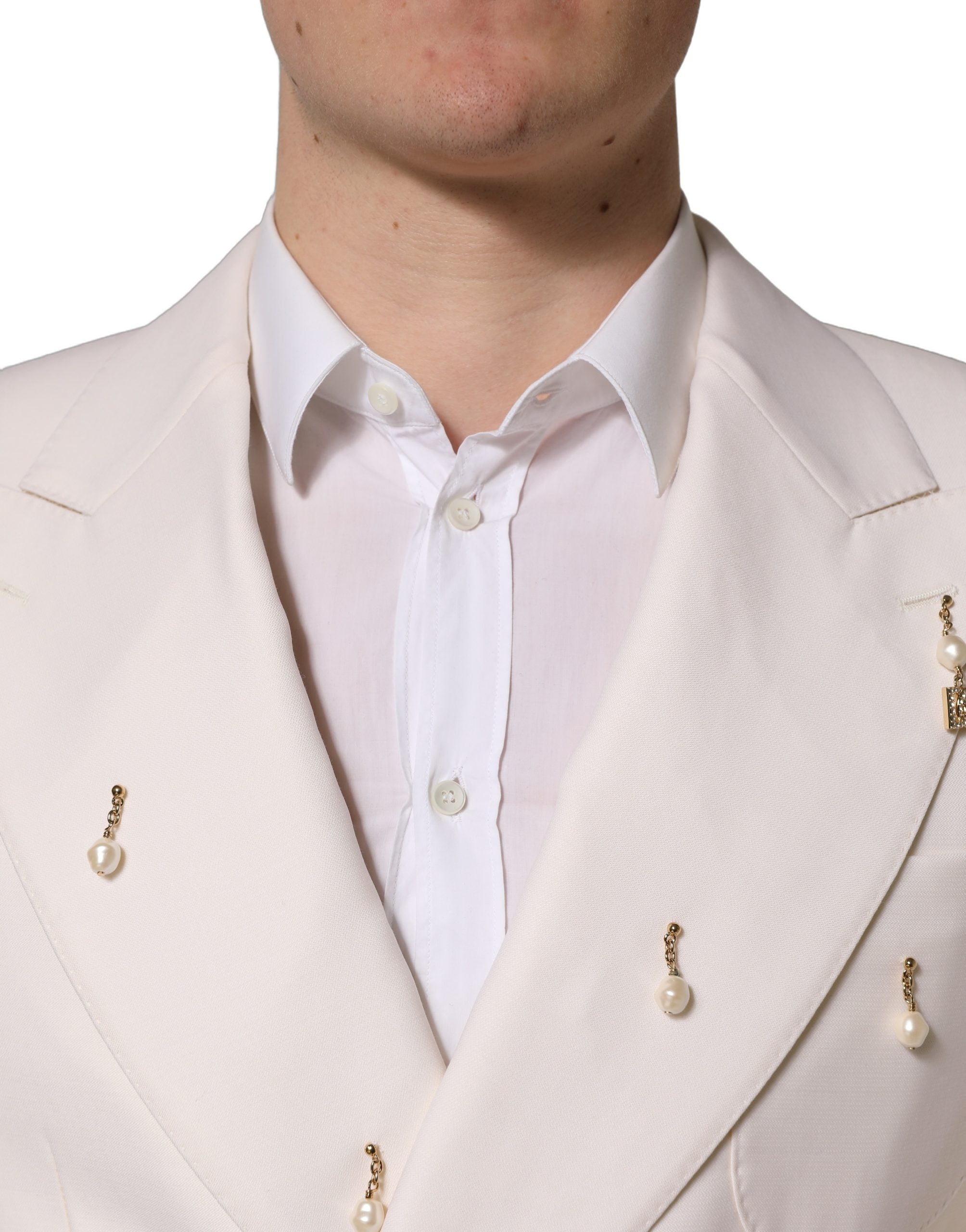 Costume homme Dolce & Gabbana en laine blanche, costume deux pièces ajusté pour occasions formelles, vue de face.