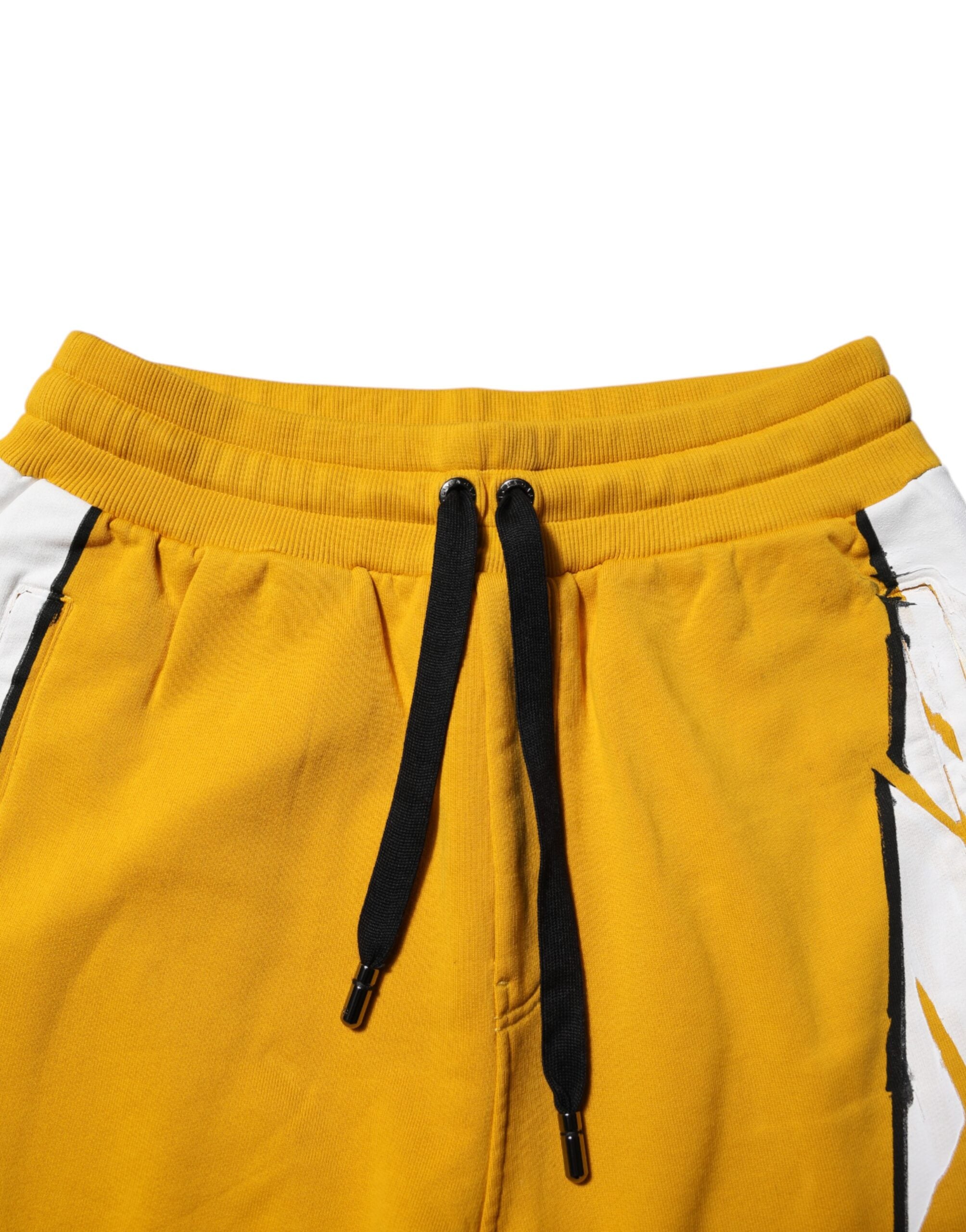 Pantalons de jogging Dolce & Gabbana en coton jaune avec imprimé floral, style décontracté et confortable.