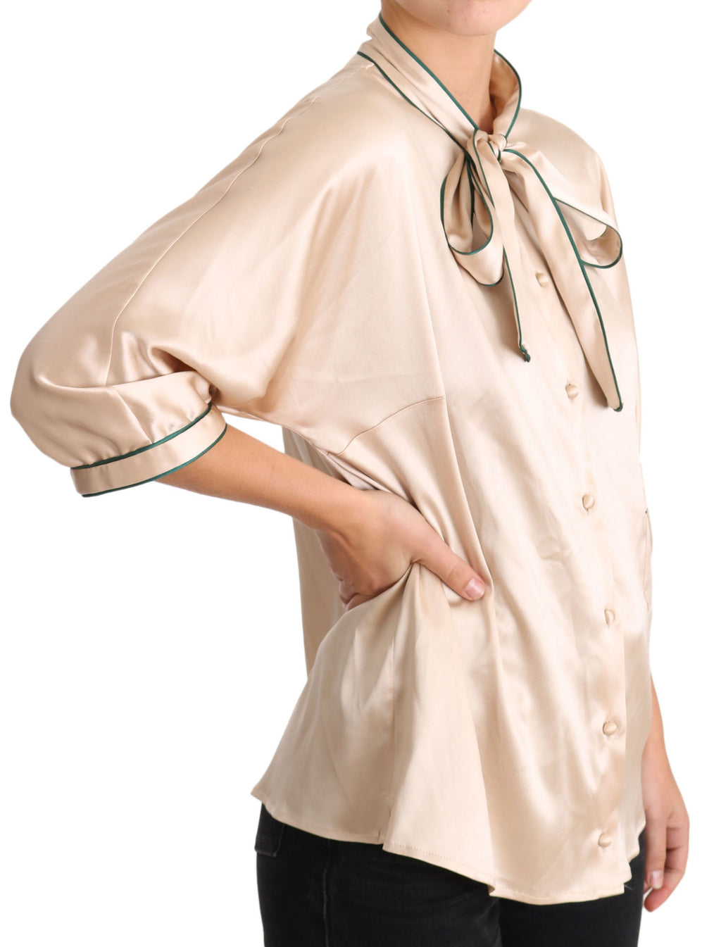 Blouse en soie stretch beige avec ruban Dolce & Gabbana, top élégant à manches longues et décolleté flatteur.