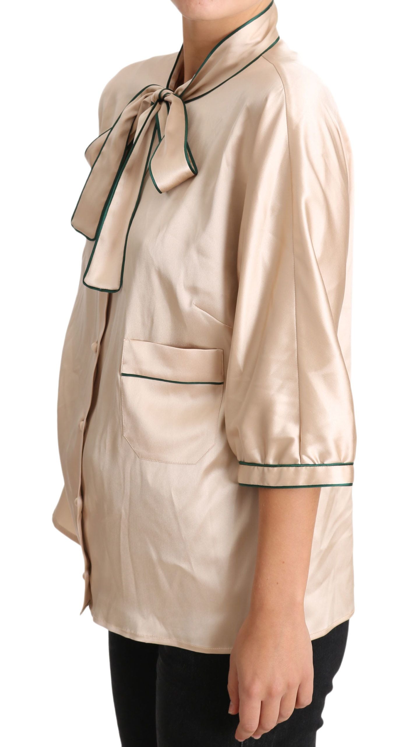 Chemisier Dolce & Gabbana en soie beige avec ruban stretch, élégant haut à manches longues et détails raffinés.