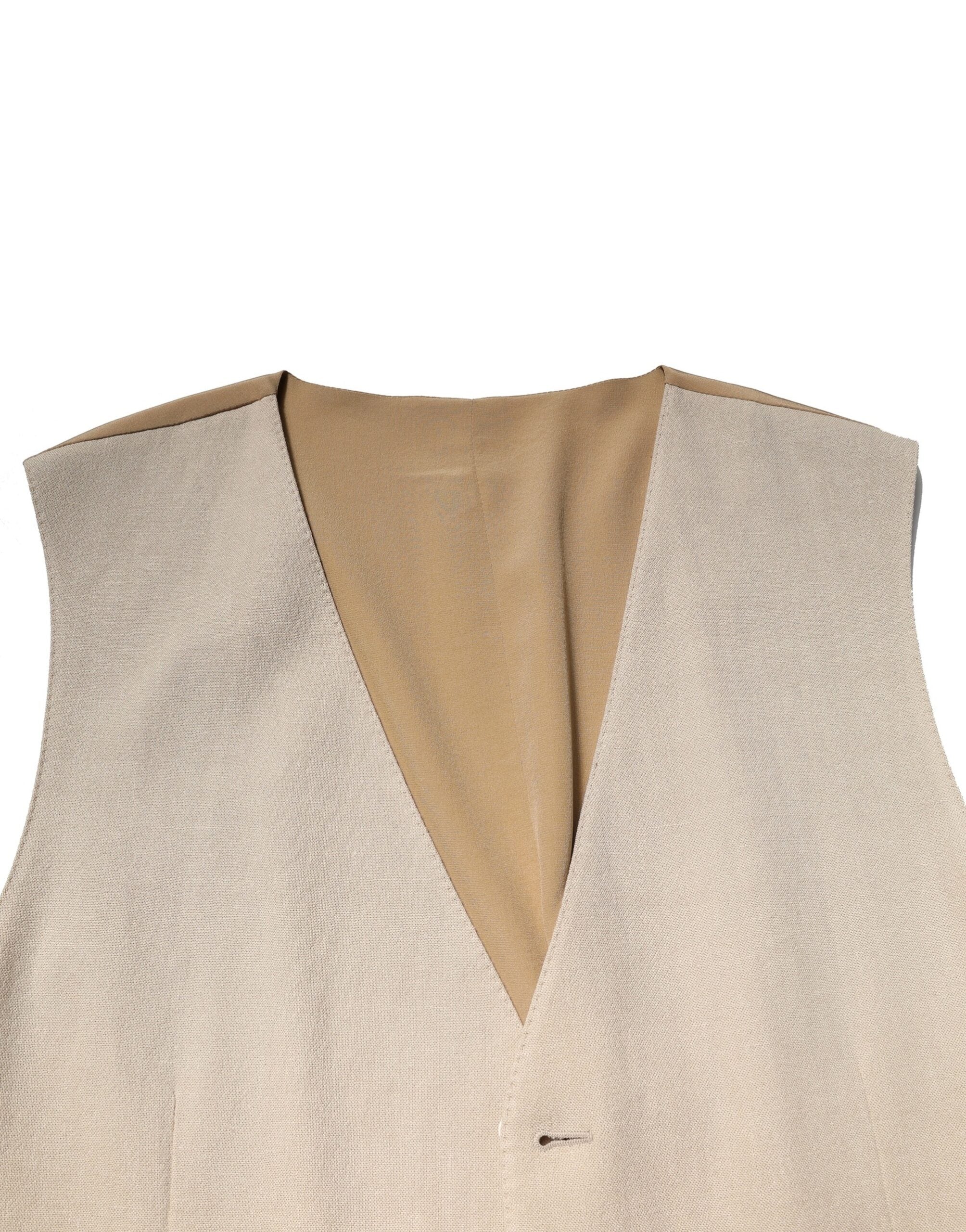 Gilet homme beige en lin Dolce & Gabbana, vêtement formel avec coupe élégante et détails sophistiqués.