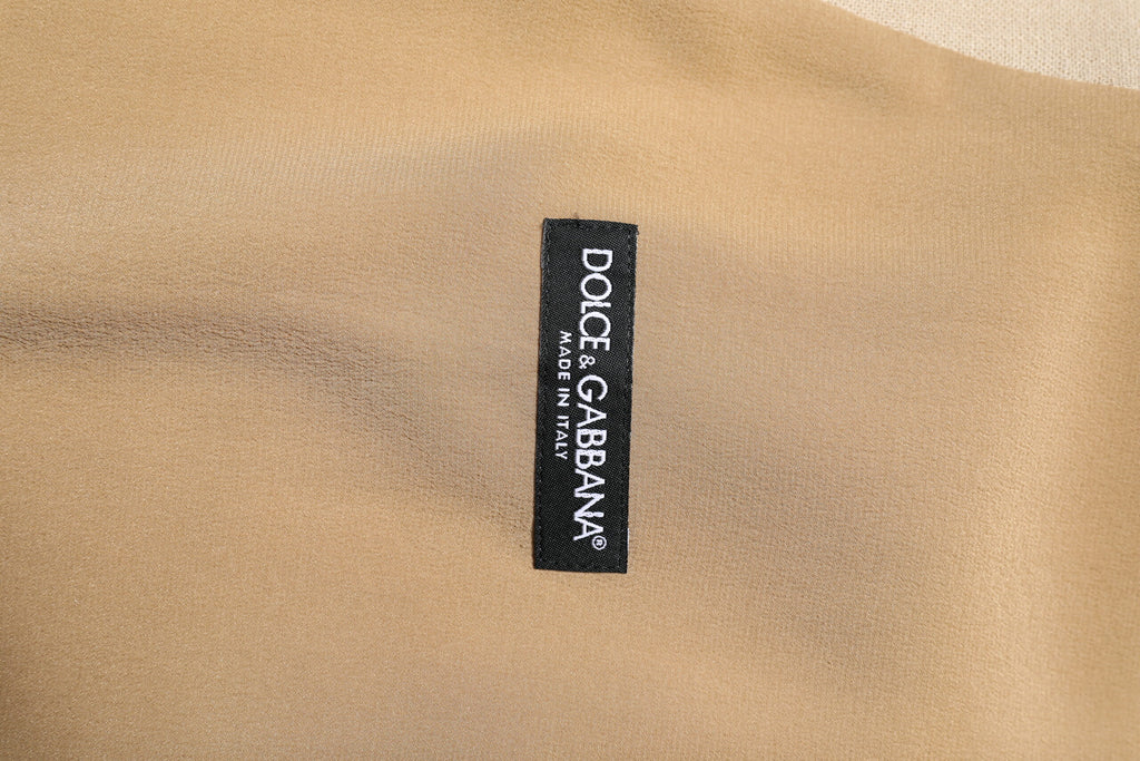 Gilet homme beige en lin Dolce & Gabbana, veste formelle élégante, vêtement chic pour occasions spéciales.