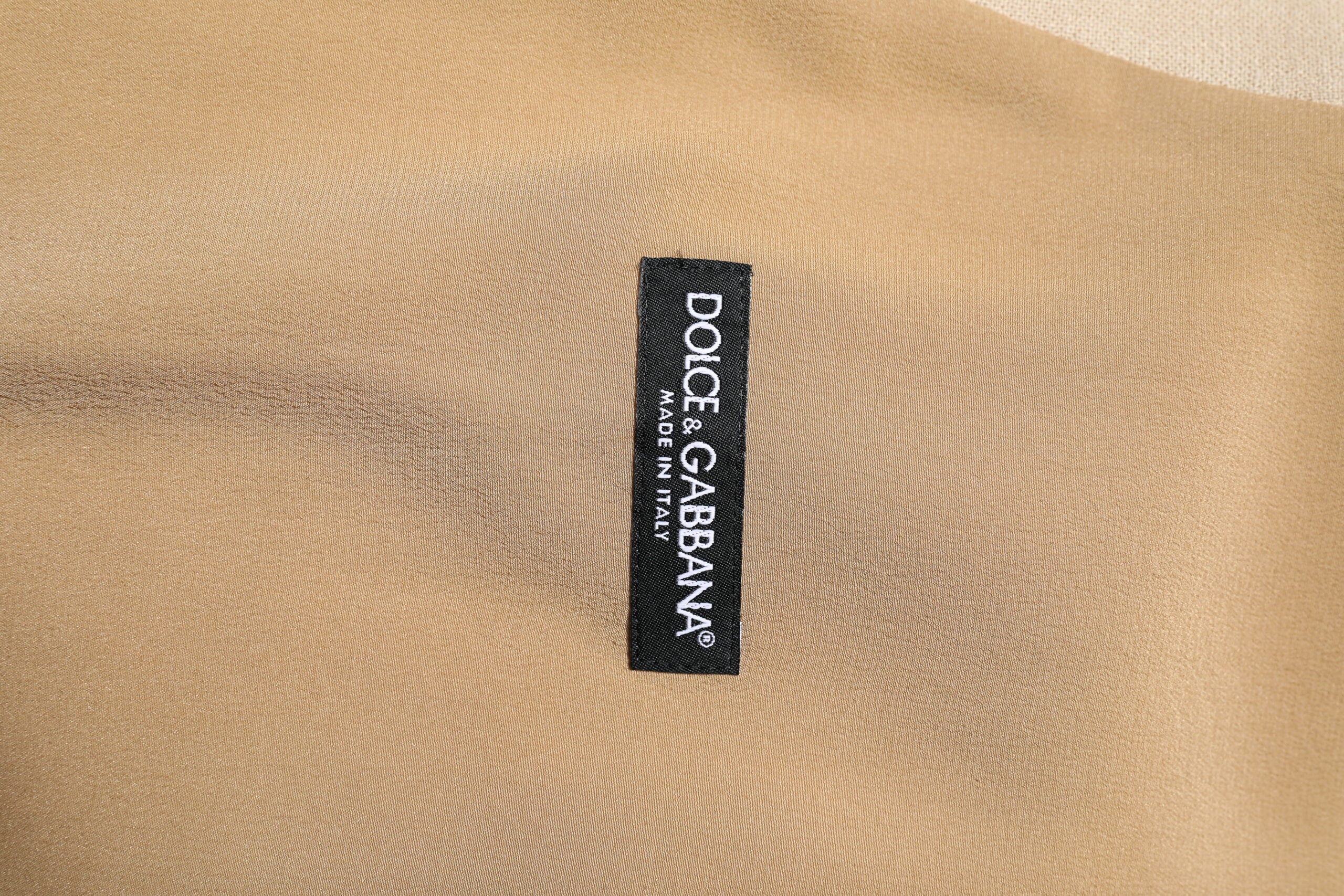 Gilet homme beige en lin Dolce & Gabbana, veste formelle élégante, vêtement chic pour occasions spéciales.