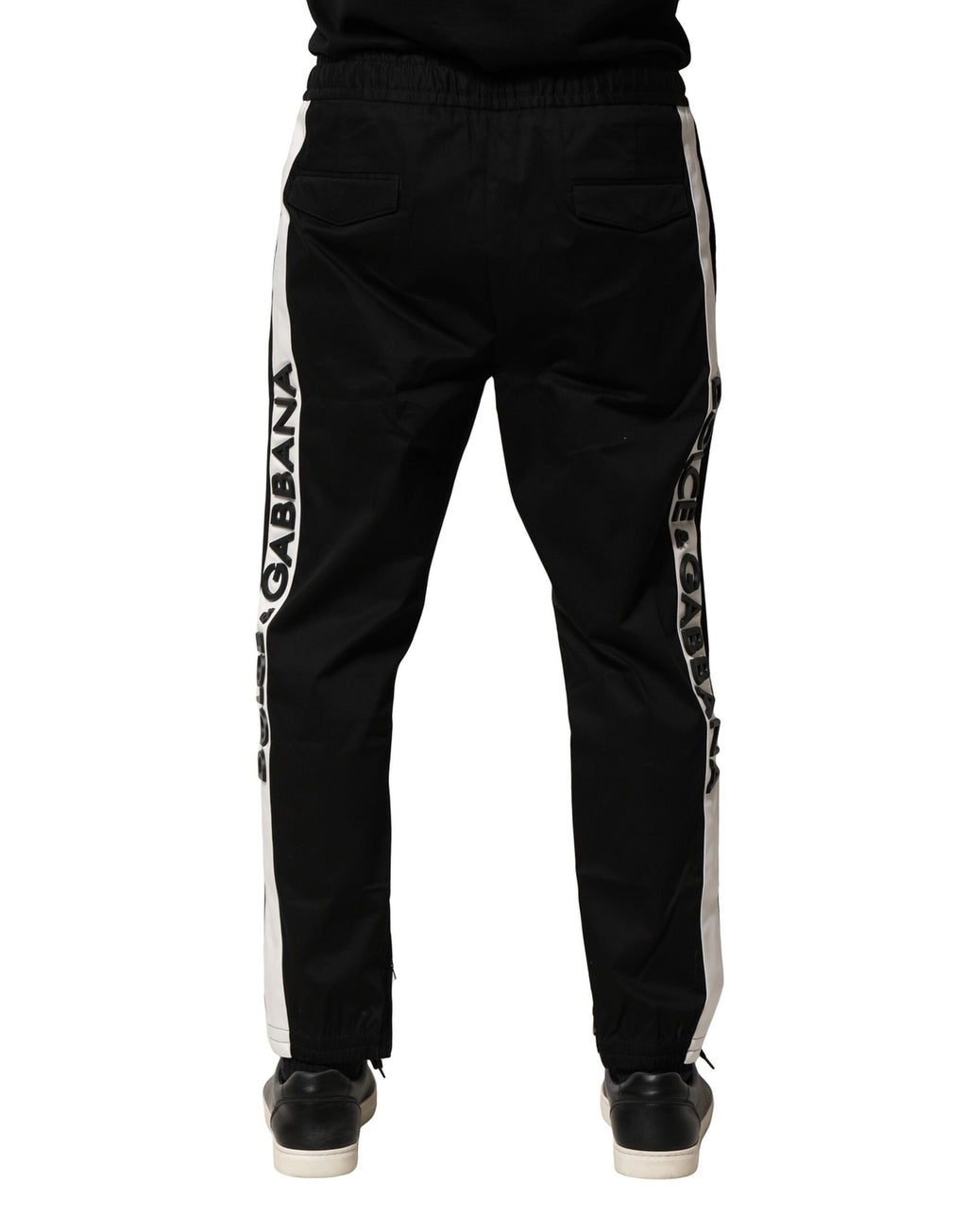 Pantalons joggers noirs en coton à taille moyenne de Dolce & Gabbana, visibles avec détails et texture du tissu.