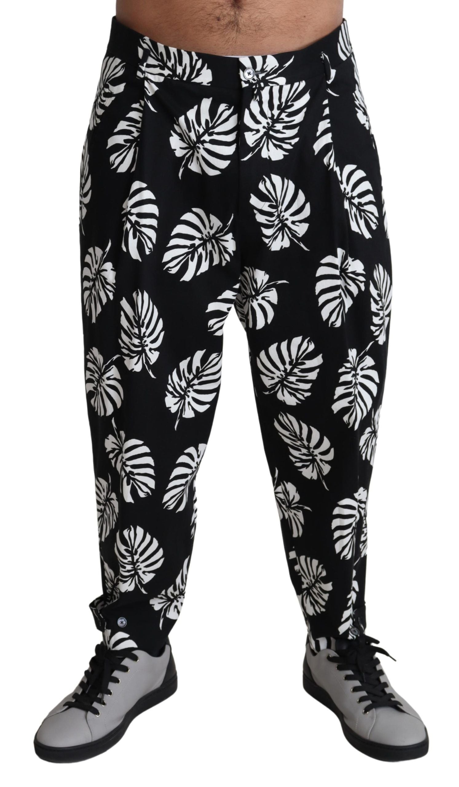 Pantalon noir en coton extensible avec motif de feuilles de Dolce & Gabbana, style élégant et confortable pour homme.