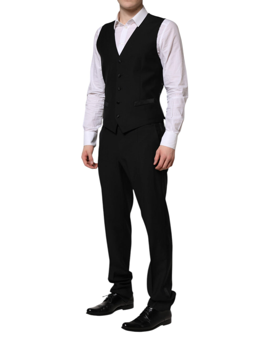 Costume noir Dolce & Gabbana Martini en trois pièces avec cristaux, élégant et sophistiqué, visible détails du tissu et embellissements.