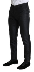 Robe pantalon skinny métallique noire Dolce & Gabbana, style élégant et moderne avec finition brillante.