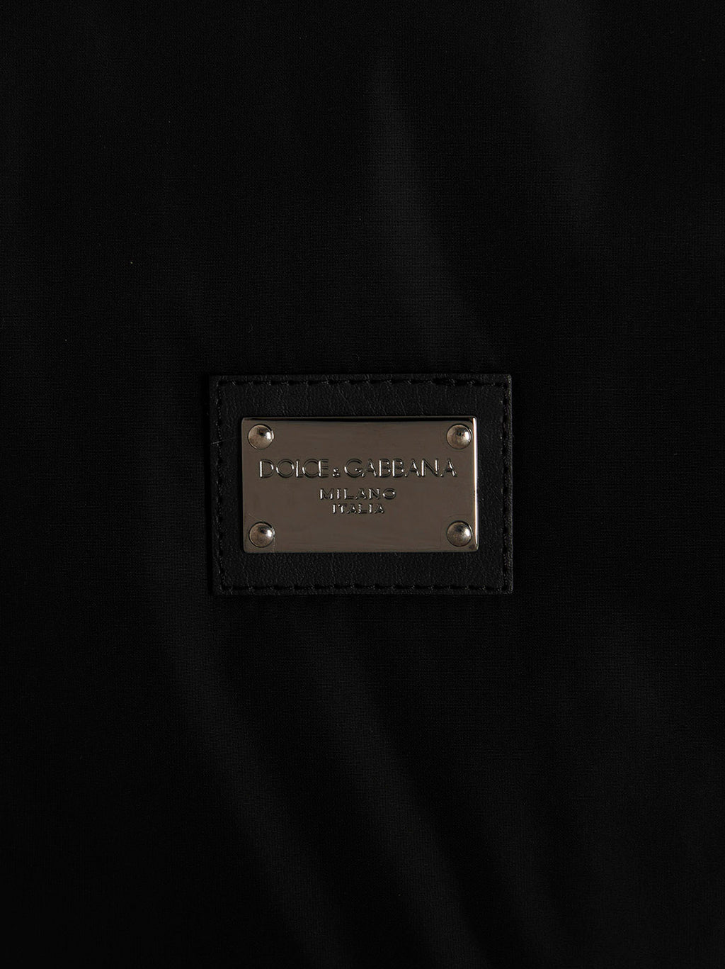 Veste bomber noire en polyamide de Dolce & Gabbana, style élégant et moderne, visible en détail dans l'image.