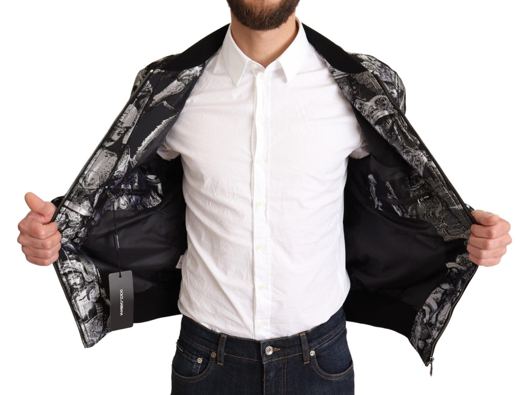 Veste bomber noire et argent Dolce & Gabbana avec motif Puppi, détails élégants et style moderne.