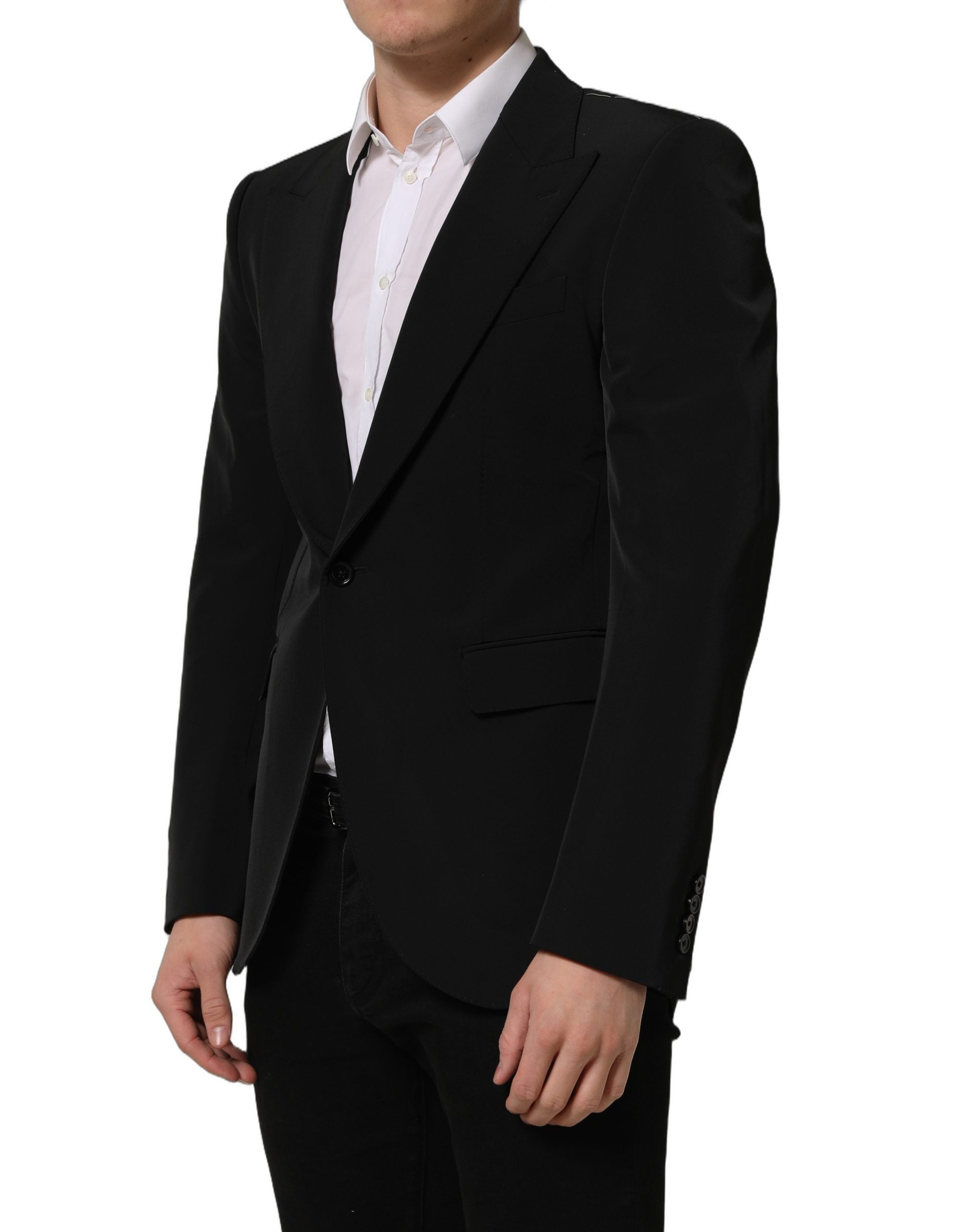 Manteau blazer noir Dolce & Gabbana à un seul bouton, coupe croisée et élégante, porté sur un mannequin.