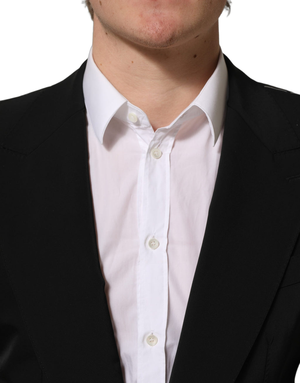Manteau blazer noir Dolce & Gabbana à un seul bouton, coupe classique, en tissu élégant, porté sur un mannequin.
