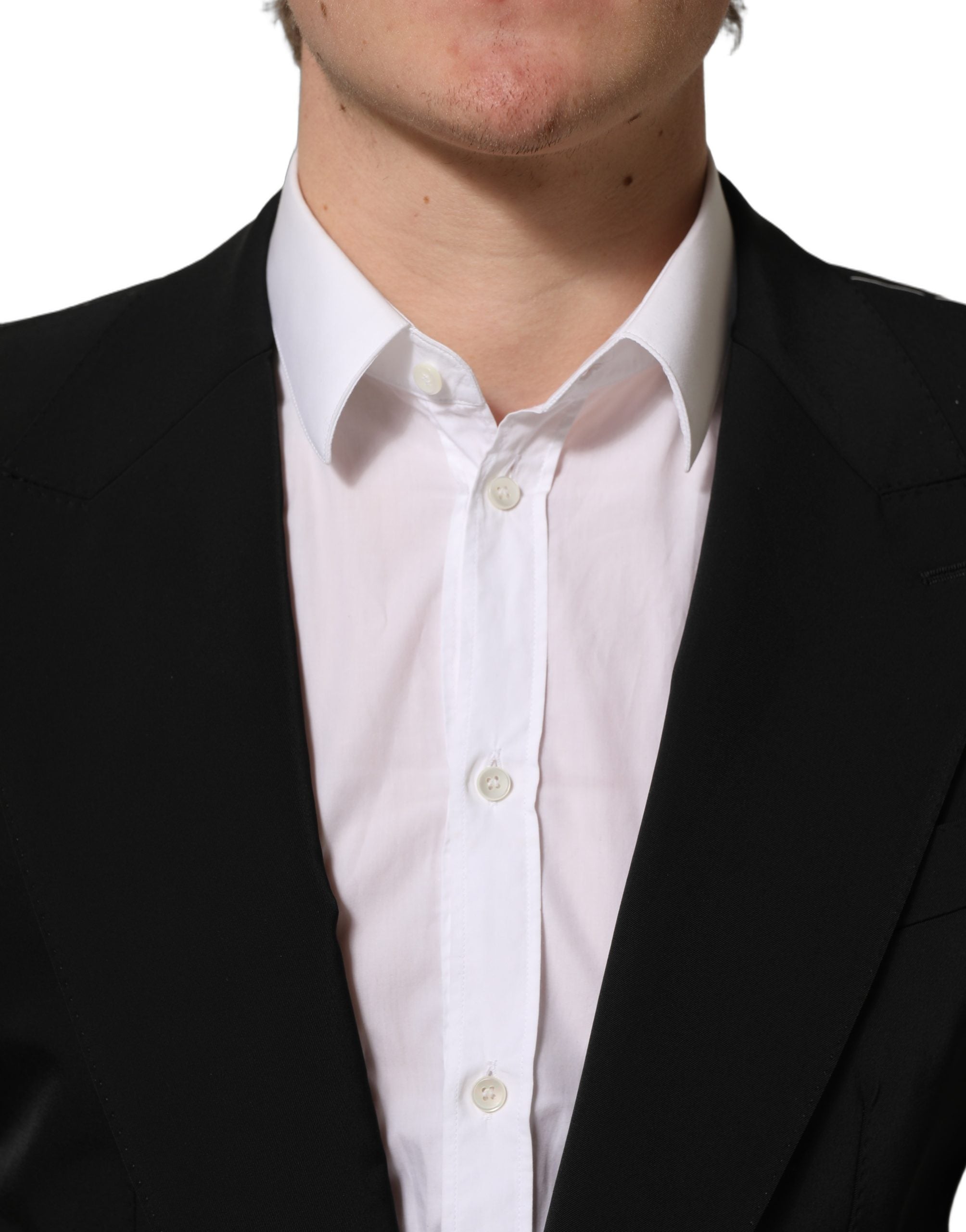 Manteau blazer noir Dolce & Gabbana à un seul bouton, coupe classique, en tissu élégant, porté sur un mannequin.