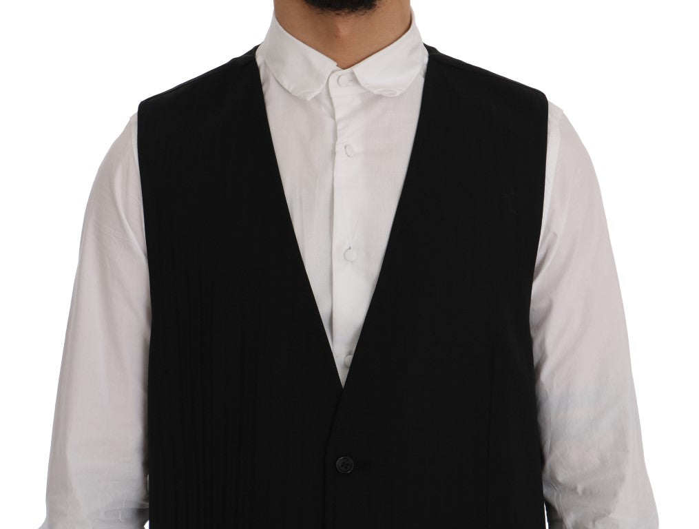 Gilet noir en laine et stretch Dolce & Gabbana STAFF, coupe ajustée, porté sur un mannequin.