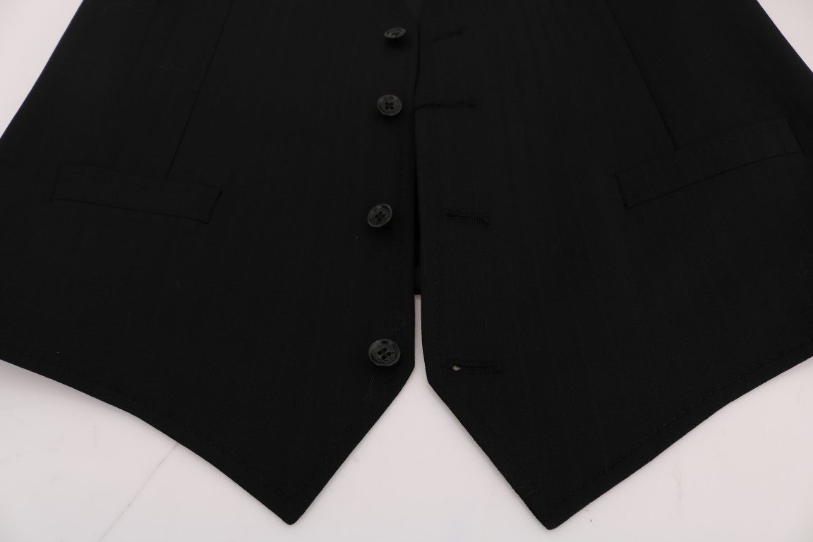 Gilet en laine stretch noir Dolce & Gabbana STAFF, coupe ajustée et détails élégants, porté sur un mannequin.