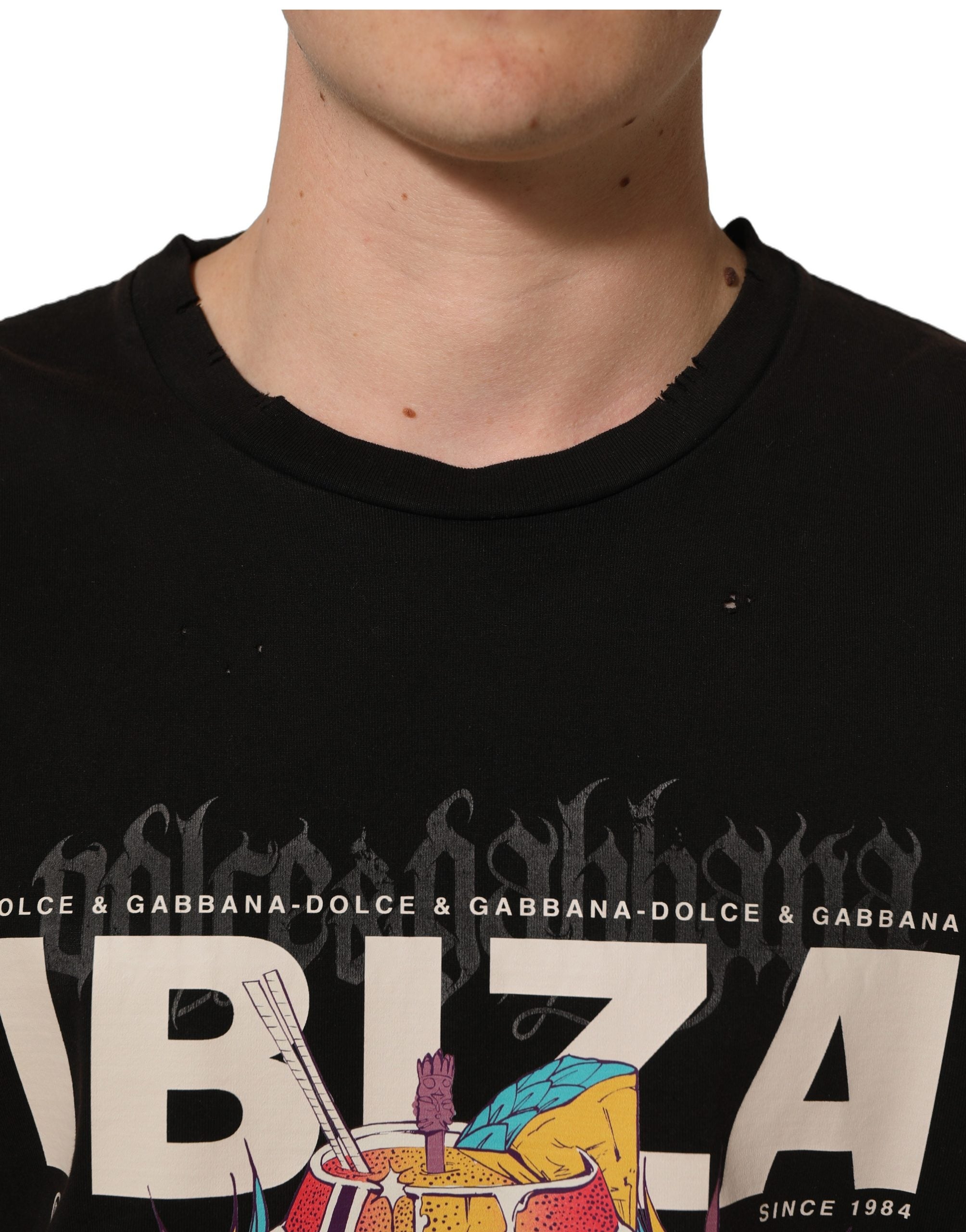 T-shirt à col rond noir Dolce & Gabbana avec motif tropical "IBIZA" pour hommes, vue de face.