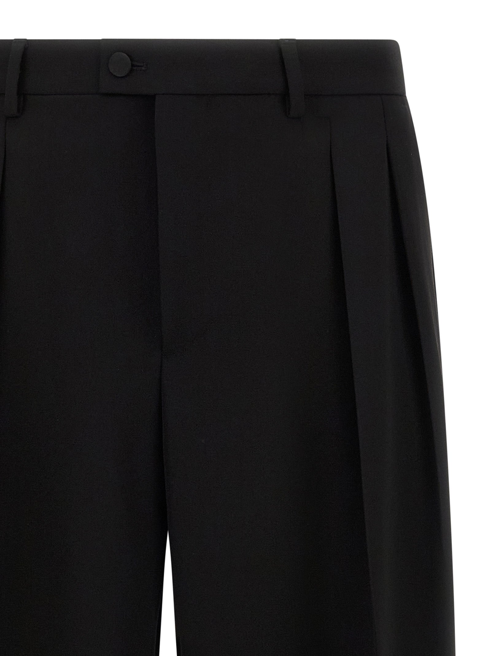 Pantalon de costume noir en laine vierge de Dolce & Gabbana, coupe élégante pour homme ou femme.
