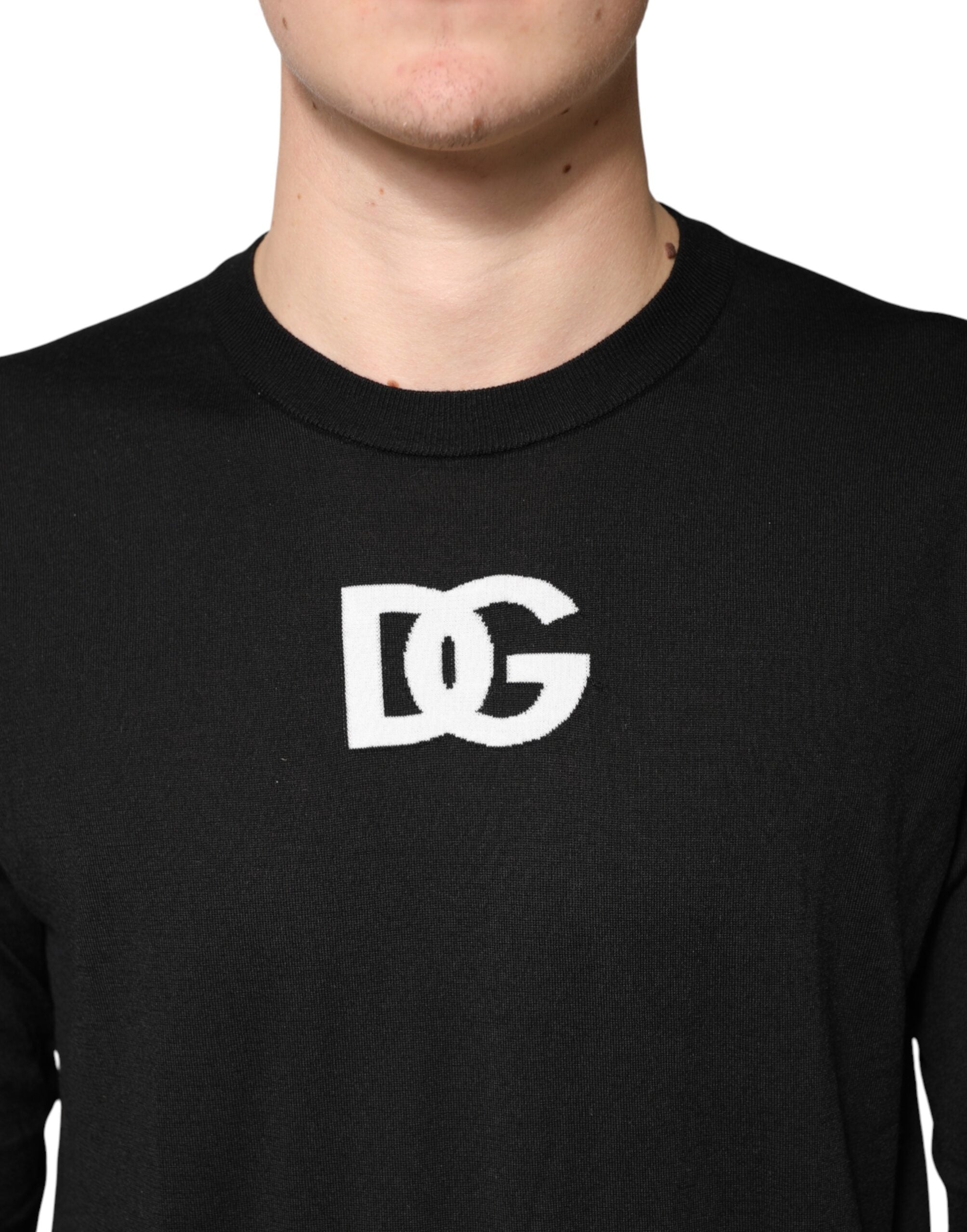 Pull-over homme en laine noire Dolce & Gabbana avec col rond, élégant et confortable, pour un style sophistiqué.