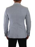 Veste blazer en coton et lin bleu de coupe slim de Dolce & Gabbana, élégante et légère, visible sur le produit.